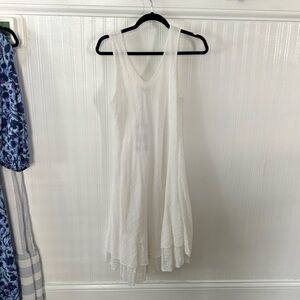 Sleeveless white asymmetrical midi dress